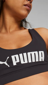 Puma fit mid impact training bra in black - Model Shot 02