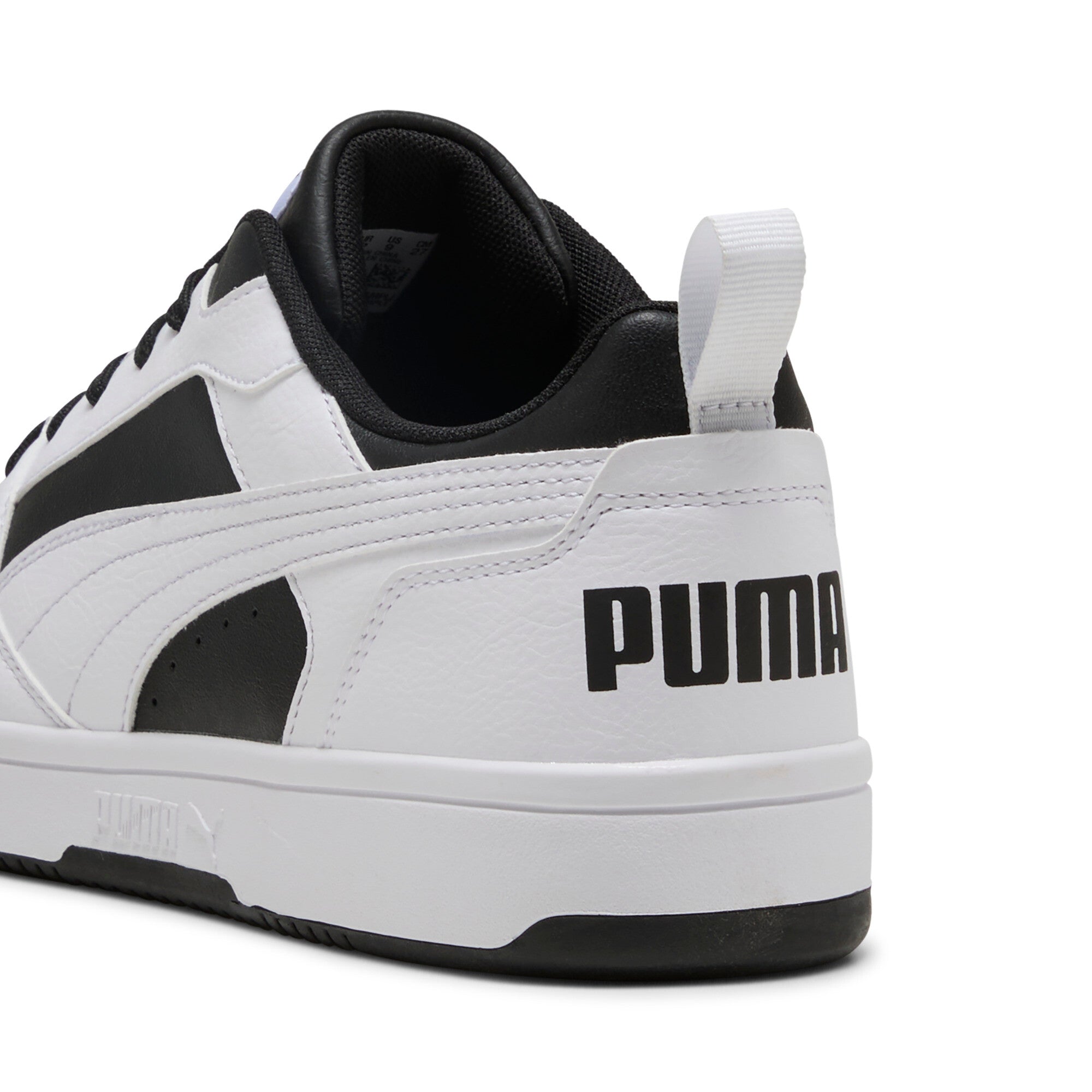 Puma rebound v6 low sneakers in black and white - Back View