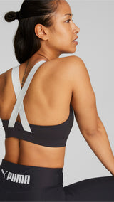 Puma fit mid impact training bra in black - Model Shot 03