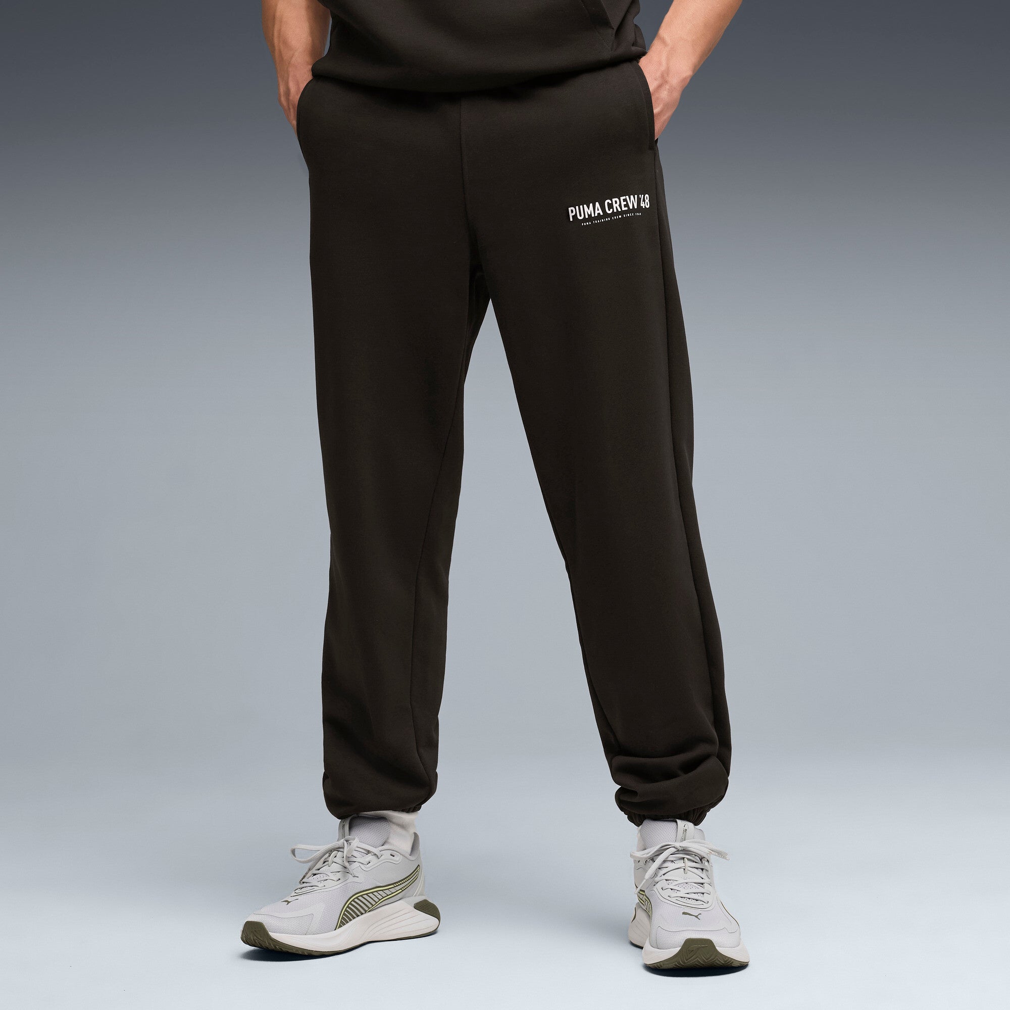 PUMA graphics training jogger pants men in black