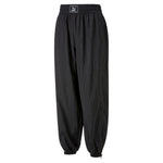 Puma dare to woven pants women in black - Front View