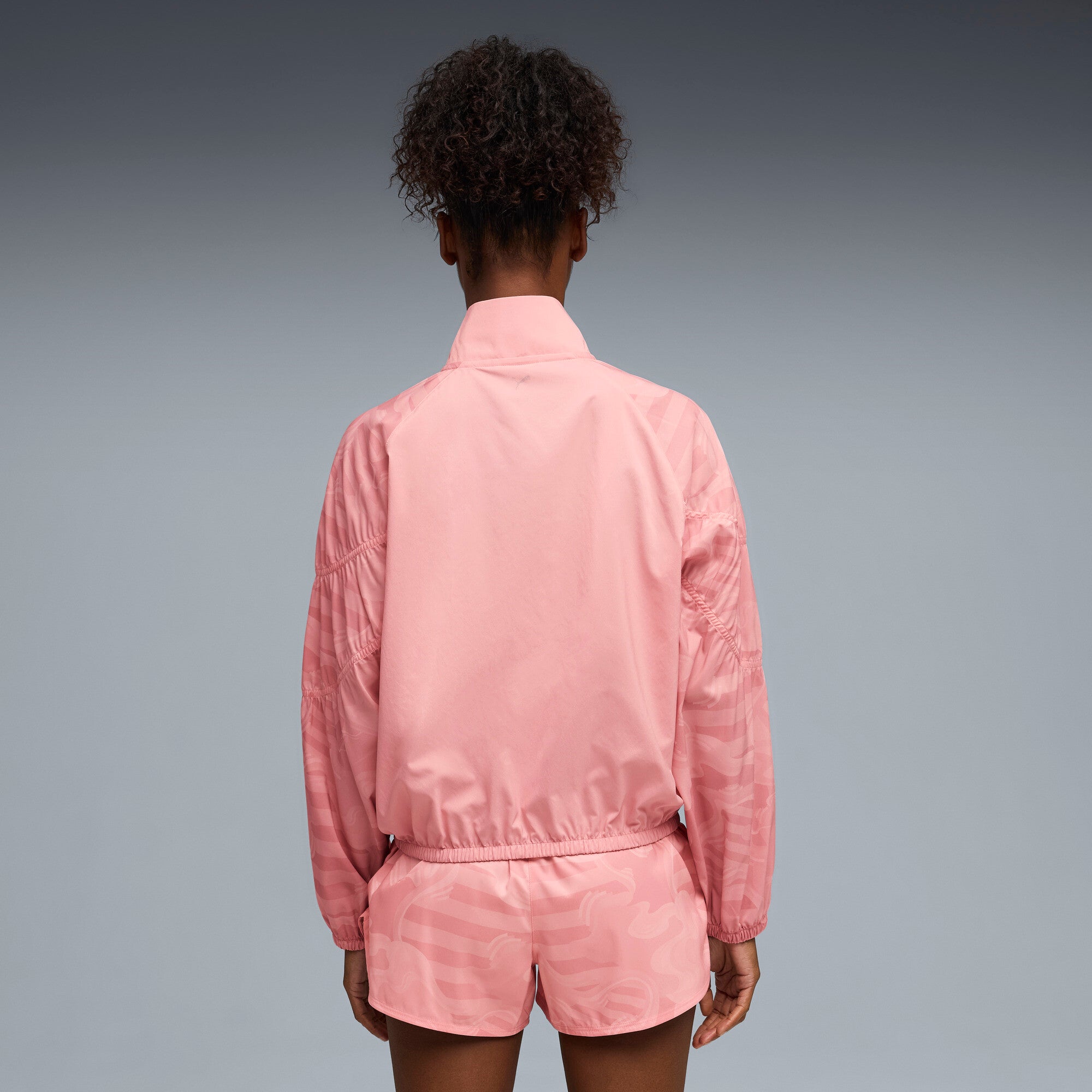 PUMA league training jacket relaxed women in rosy outlook — model shot 2