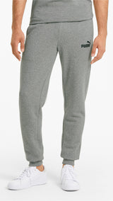 Puma essentials slim men's pants in black - Model Shot 01