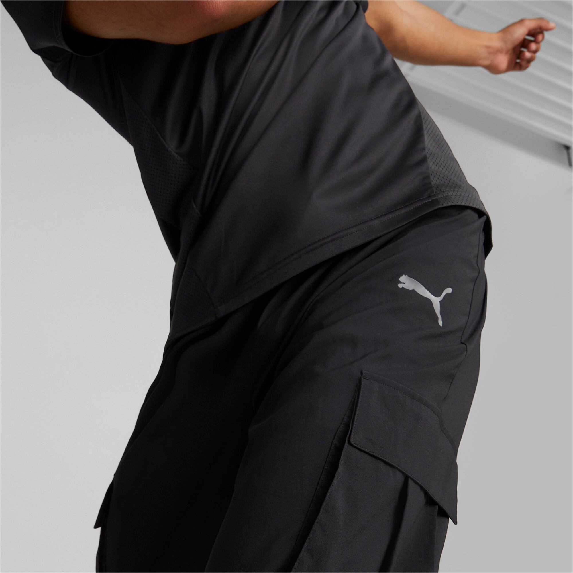 Puma training favourite woven cargo pants in black - Model Shot 02