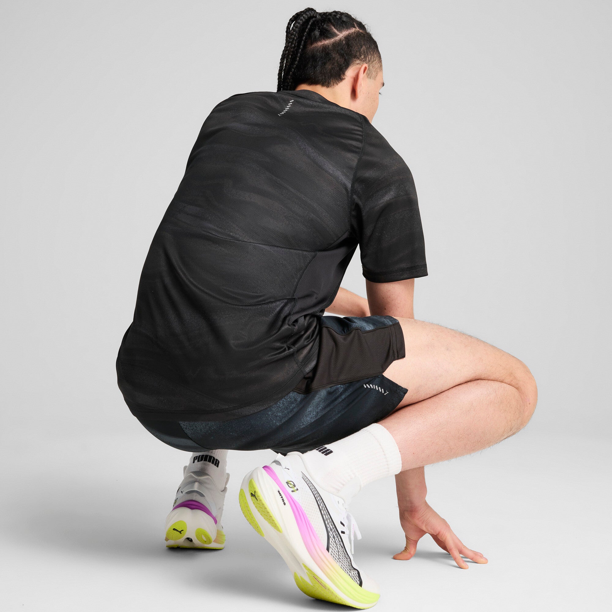 Puma running velocity all-over print tee in black - Model Shot 02
