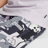 Puma essentials+ street art printed leggings youth in black - Model Shot 02
