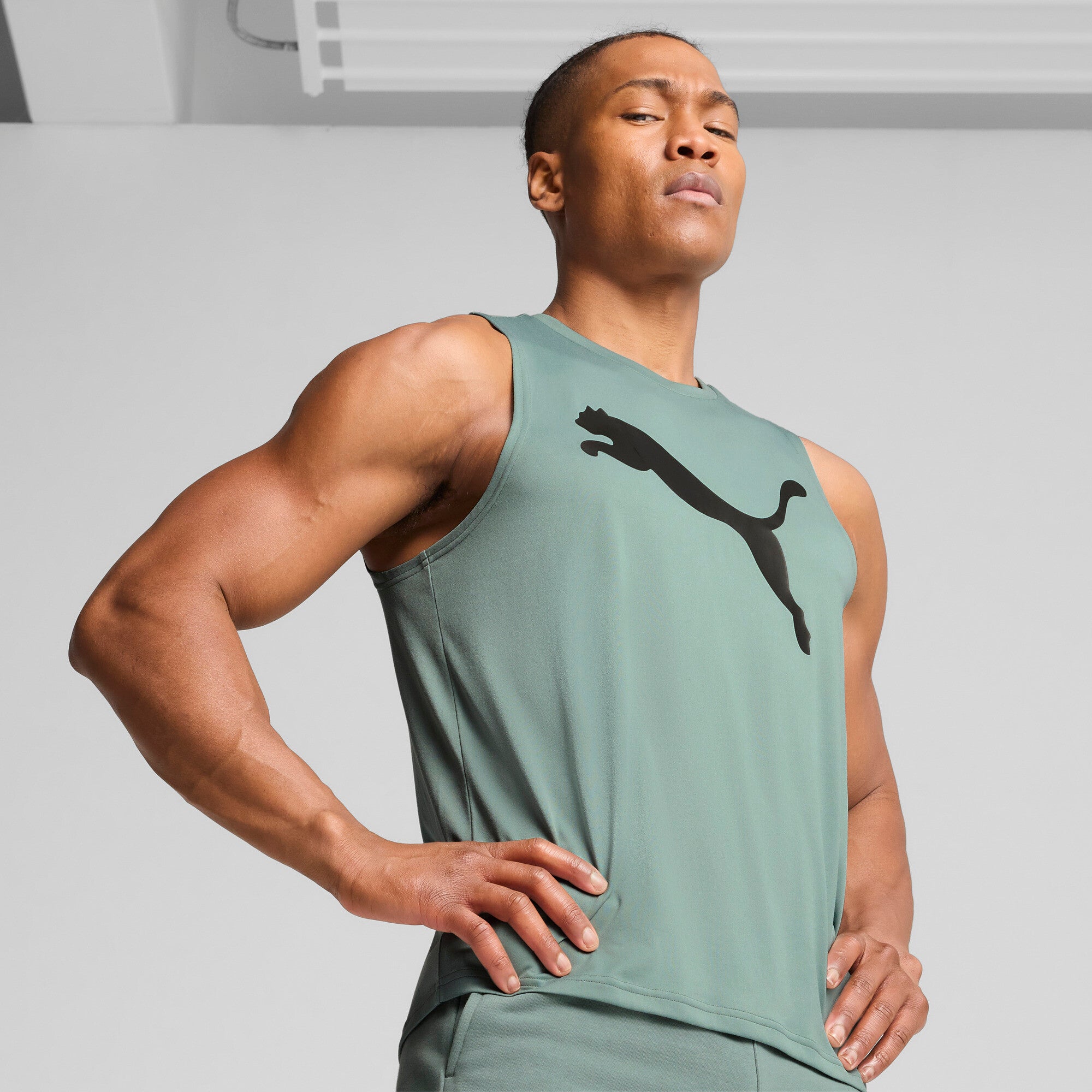 Puma tad essentials sleeveless tank in green moon - Model Shot 01