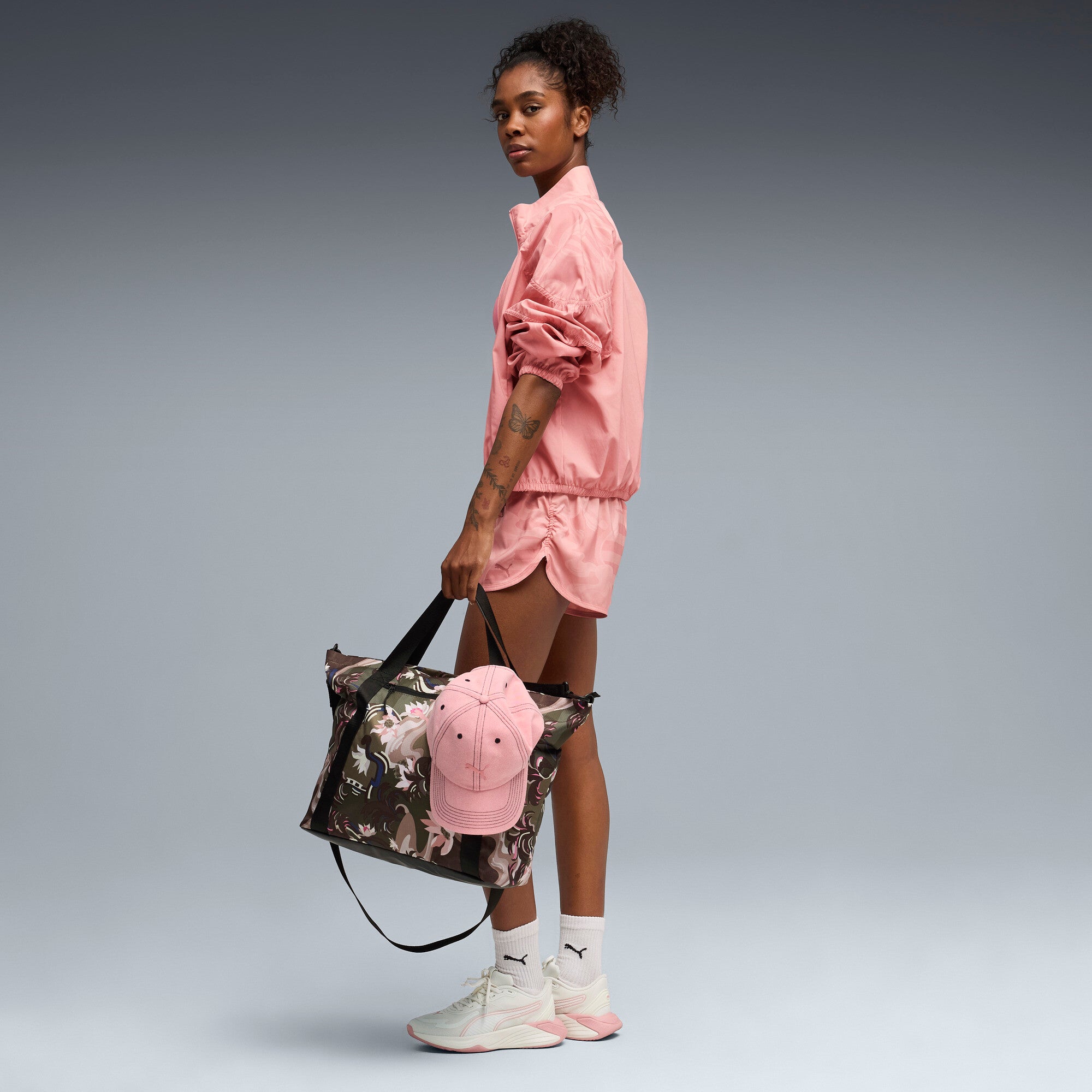 PUMA league training jacket relaxed women in rosy outlook — model shot 3