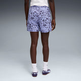 PUMA essentials graphics animal high-rise printed 4" shorts women in intense lavender — model shot 2