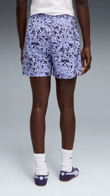 PUMA essentials graphics animal high-rise printed 4" shorts women in intense lavender — model shot 2