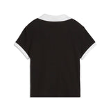 PUMA wardrobe essentials polo women in black — back view