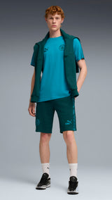 PUMA manchester city KING sweat shorts men in green and blue — model shot 3