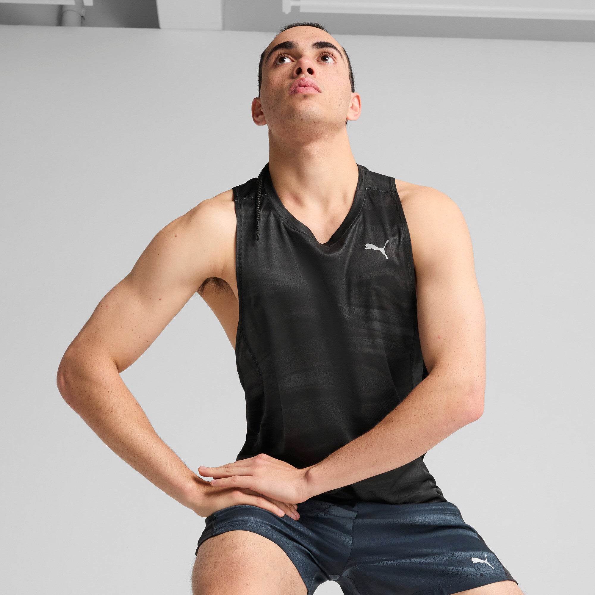 Puma running velocity all-over print polyblend tank in black - Model Shot 01