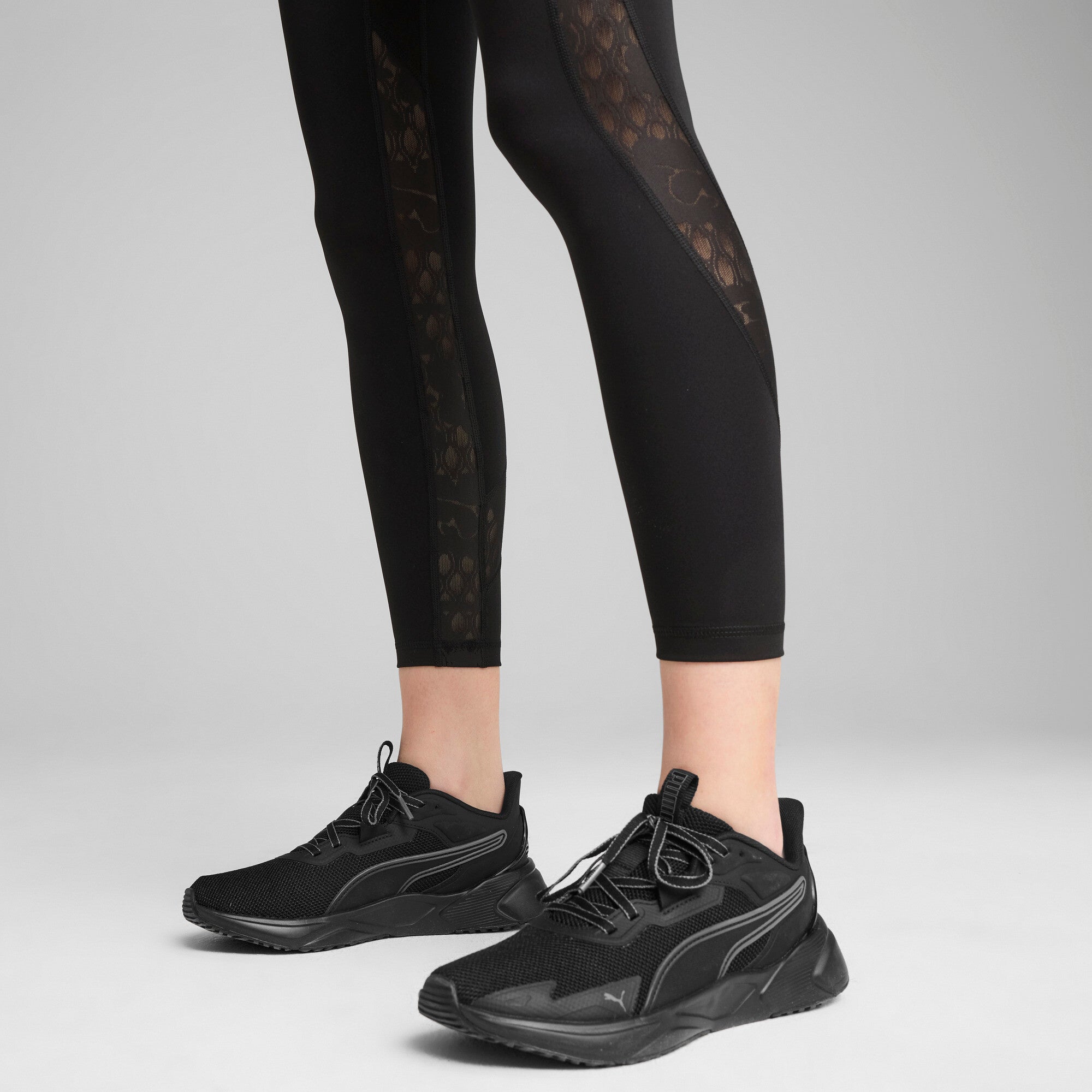 Puma lace high-waisted 7/8 tights in black - Model Shot 02