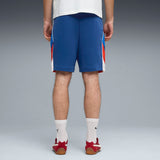 PUMA BMW M MOTORSPORT sportswear 7" shorts men in pro blue — model shot 2