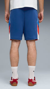 PUMA BMW M MOTORSPORT sportswear 7" shorts men in pro blue — model shot 2
