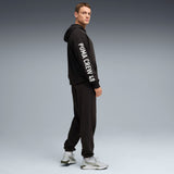 PUMA graphics training hoodie men in black — model shot 3