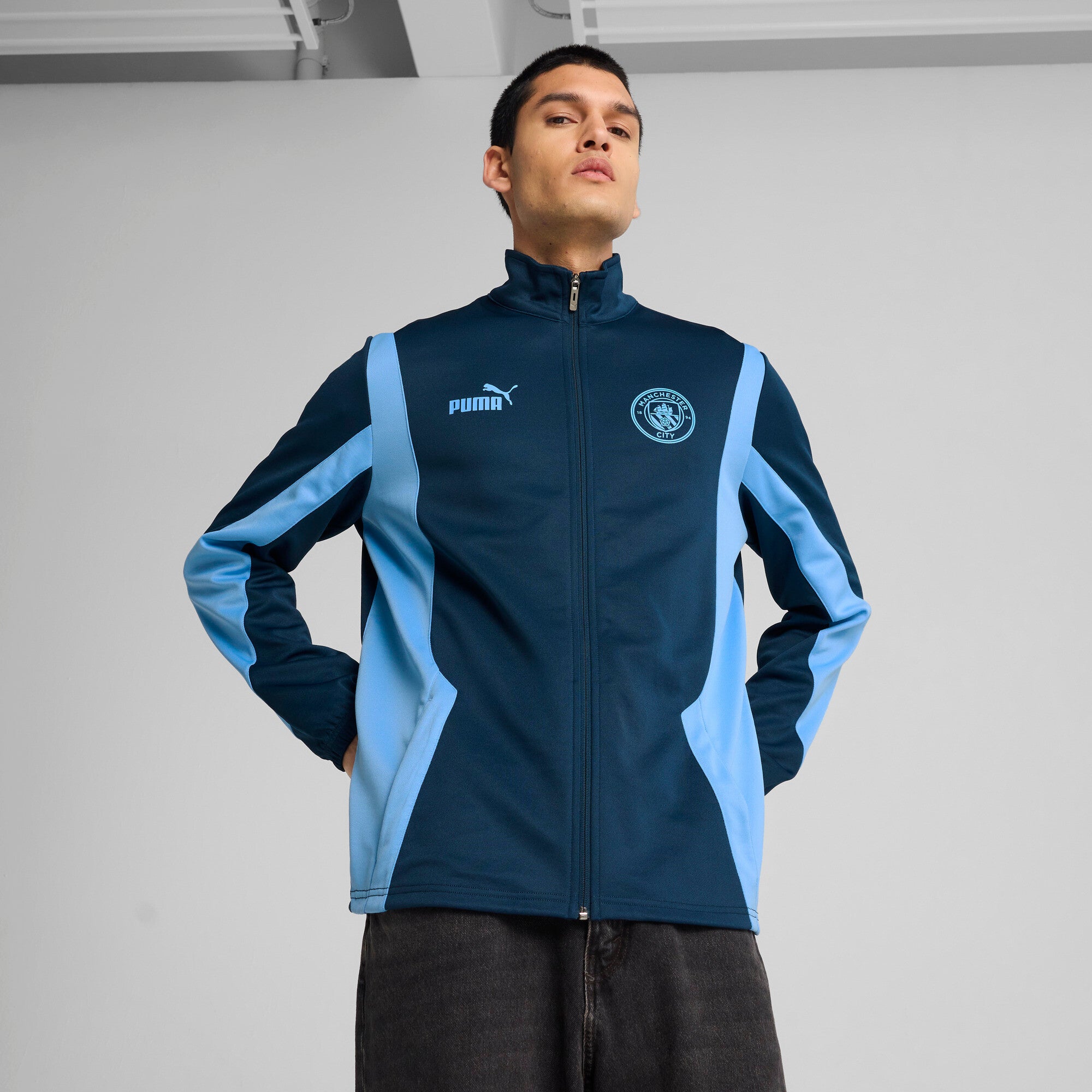 Puma manchester city ftblNRGY+ jacket in marine blue and blazing blue - Model Shot 01
