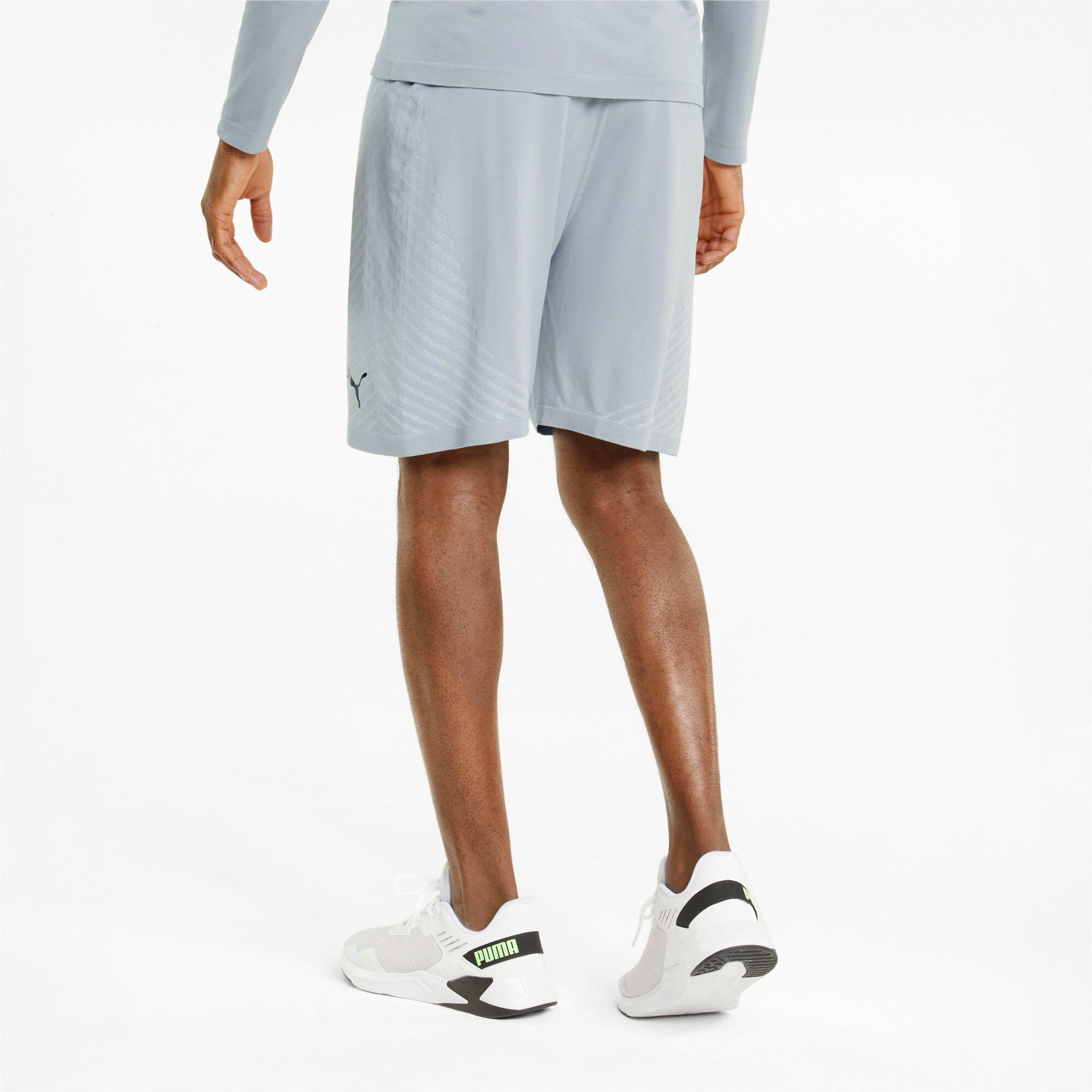 Puma training formknit seamless 7" shorts in black - Model Shot 02