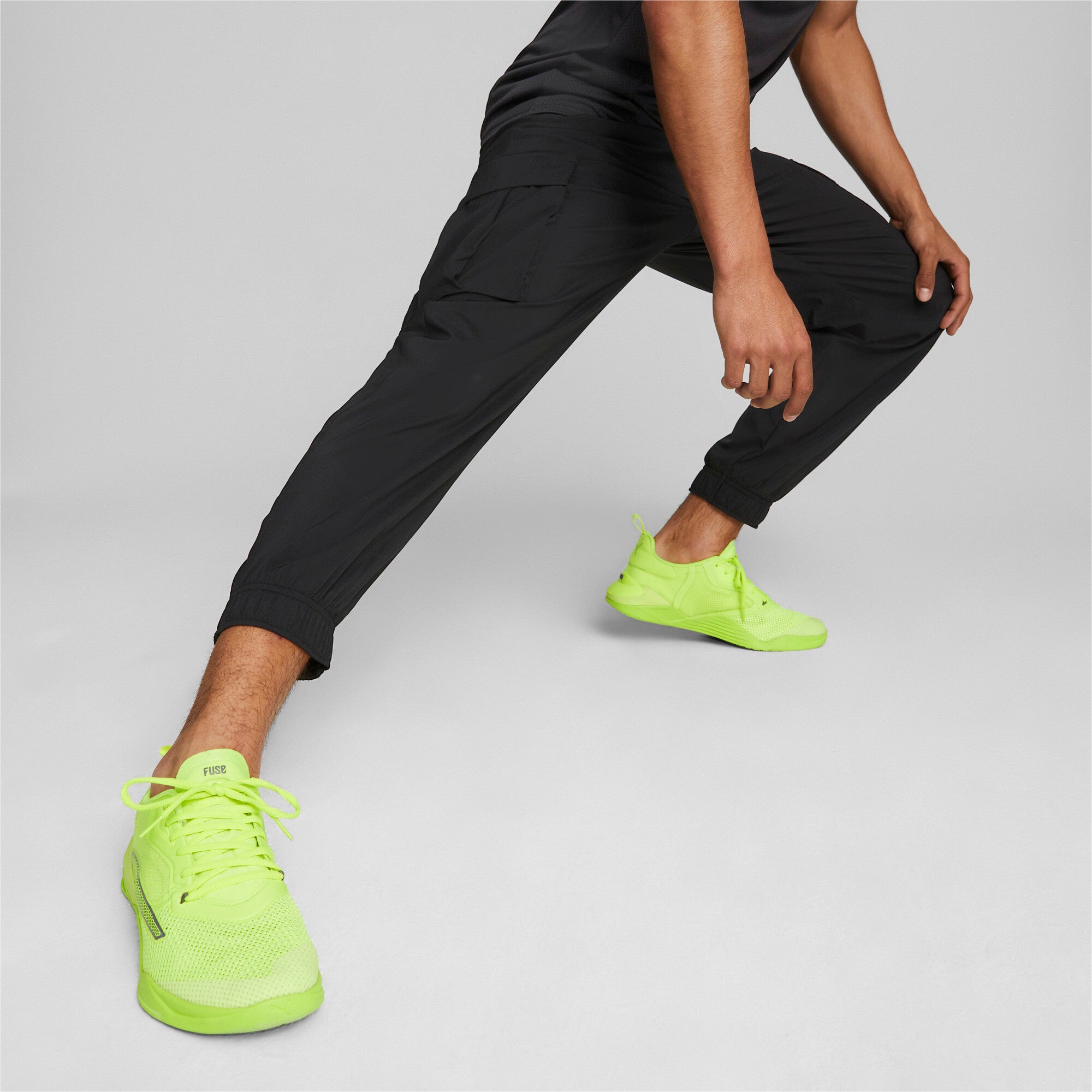 Puma training favourite woven cargo pants in black - Model Shot 01