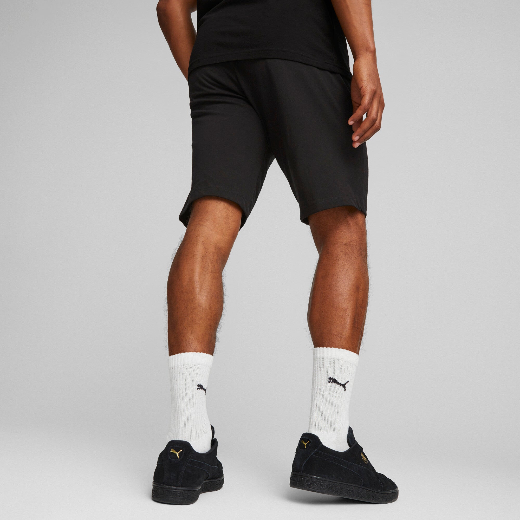 Puma essentials jersey shorts in black - Model Shot 03