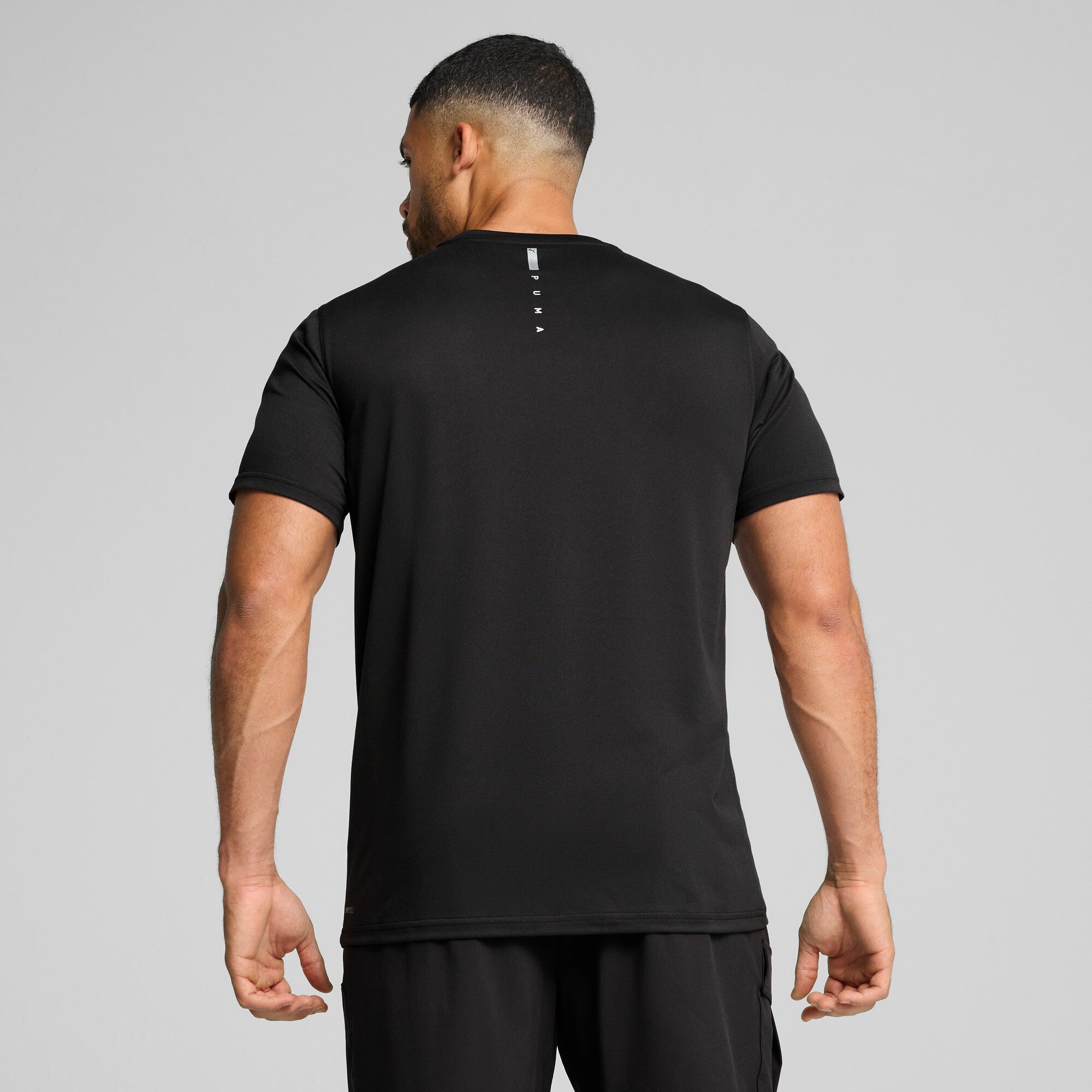 Puma flex pocket tee in black - Model Shot 02