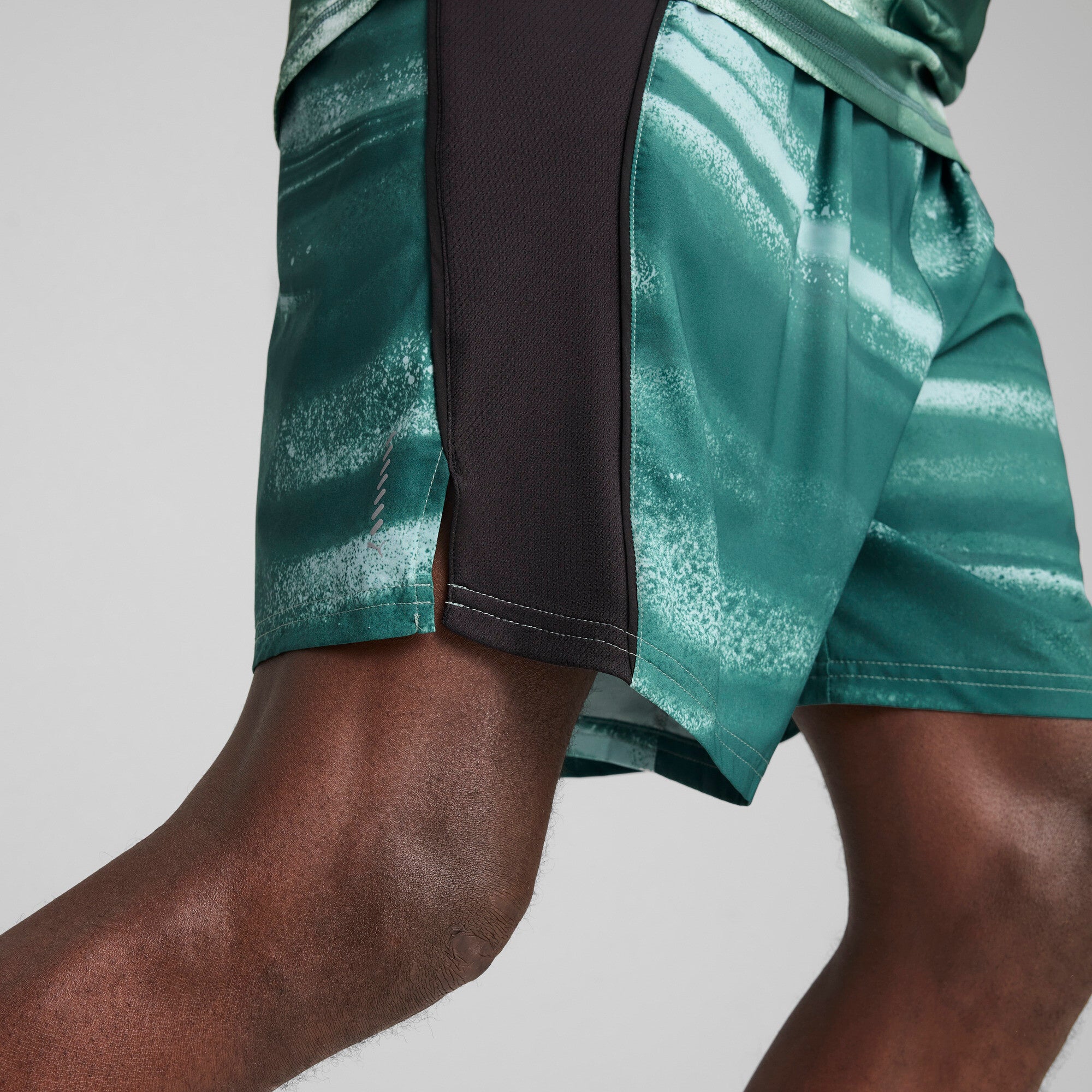 Puma VELOCITY all-over print 7" running shorts in green moon - Model Shot 02
