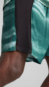 Puma VELOCITY all-over print 7" running shorts in green moon - Model Shot 02