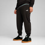 Puma essentials no. 1 logo sweatpants in black - Model Shot 03