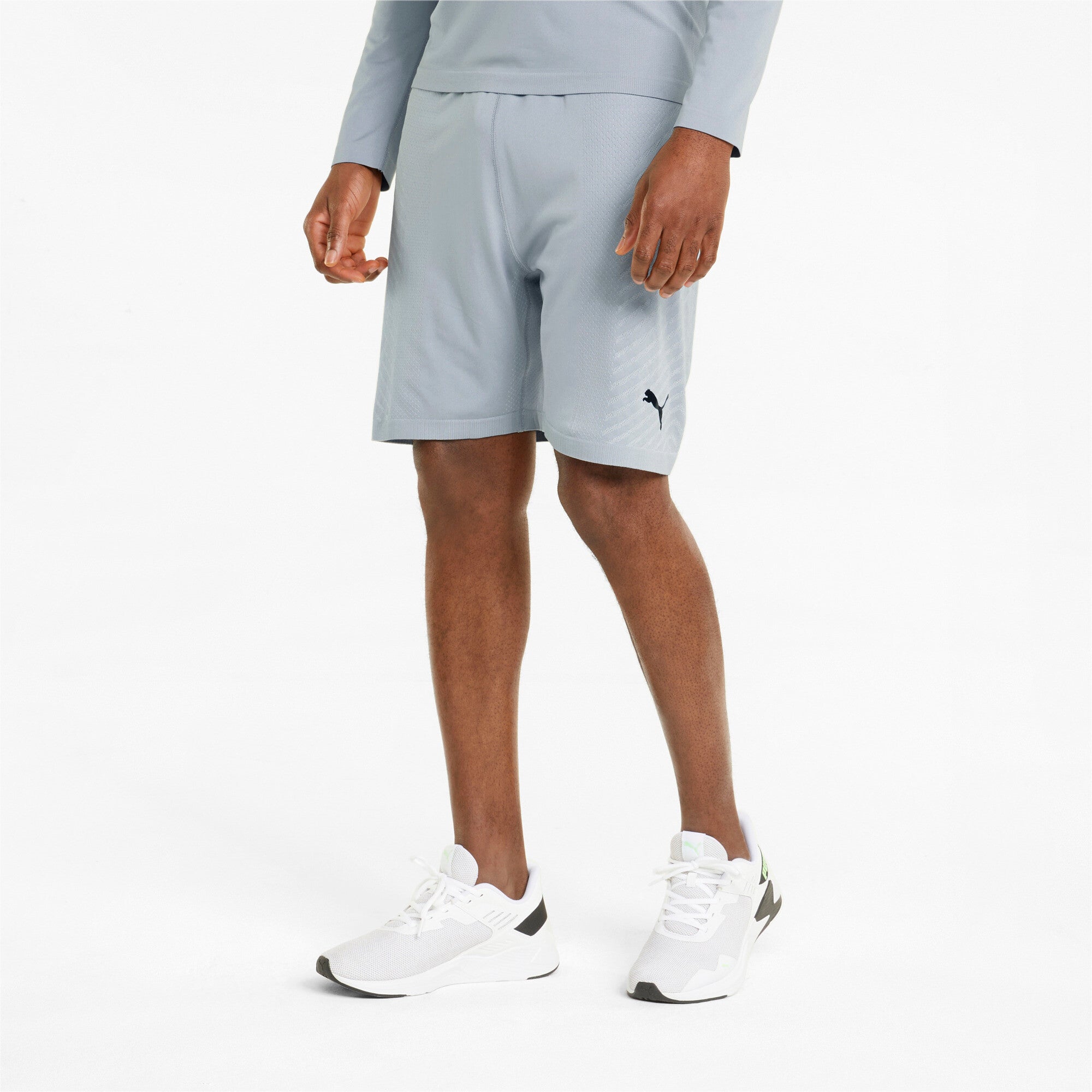 Puma training formknit seamless 7" shorts in black - Model Shot 01
