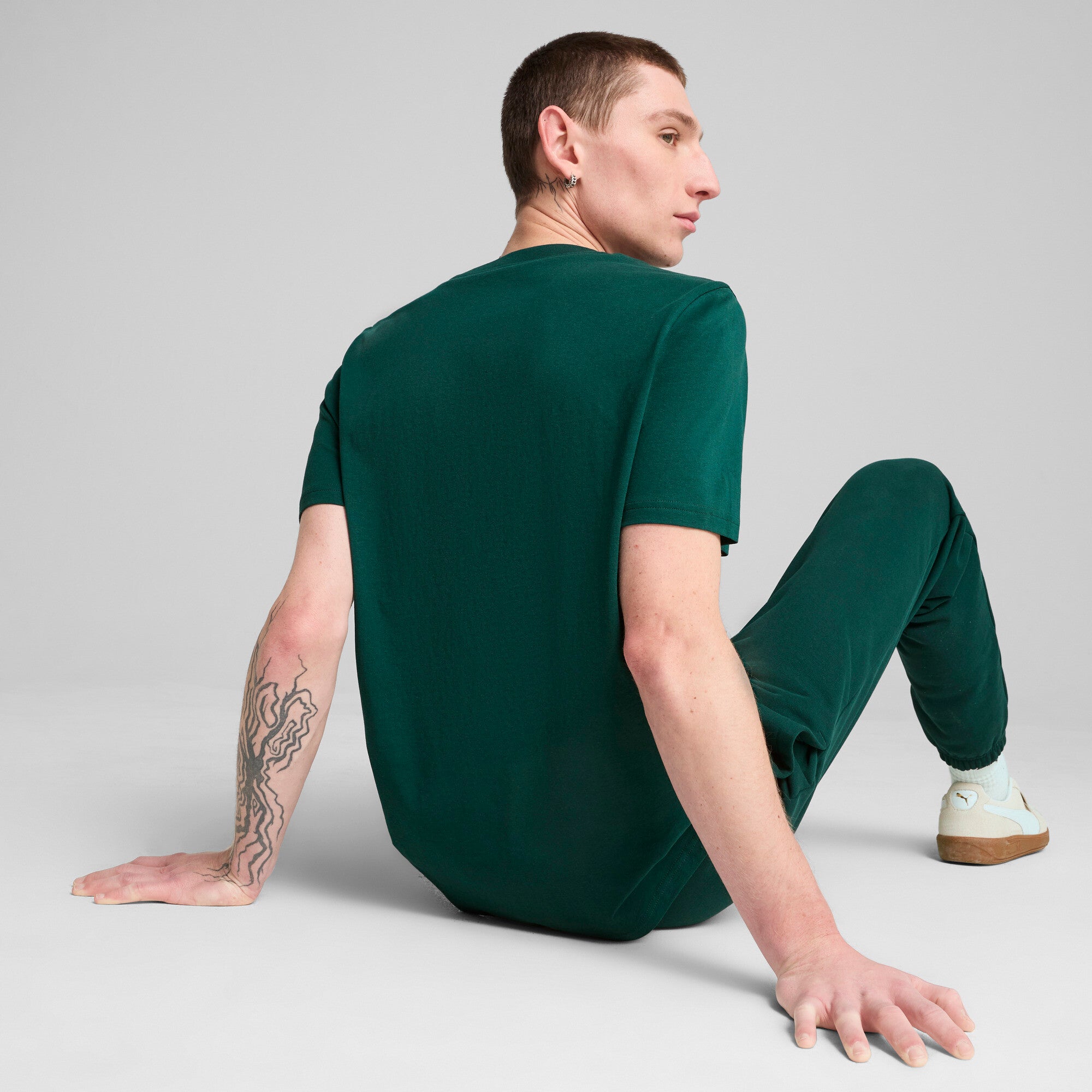 Puma sports legacy front graphic tee in dark myrtle - Model Shot 02