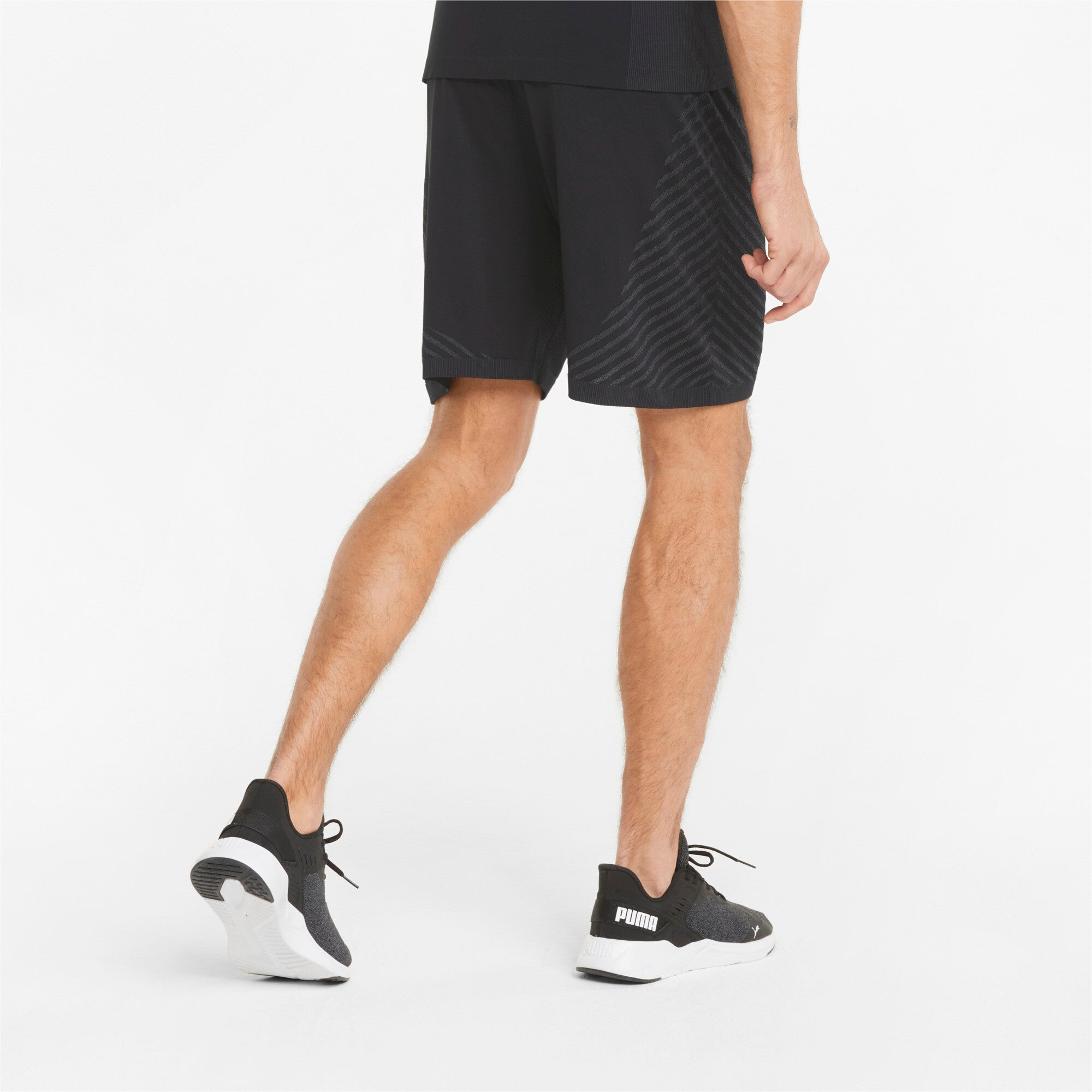 Puma training formknit seamless 7" shorts in black - Model Shot 02