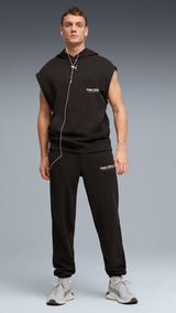 PUMA graphics training jogger pants men in black — model shot 3
