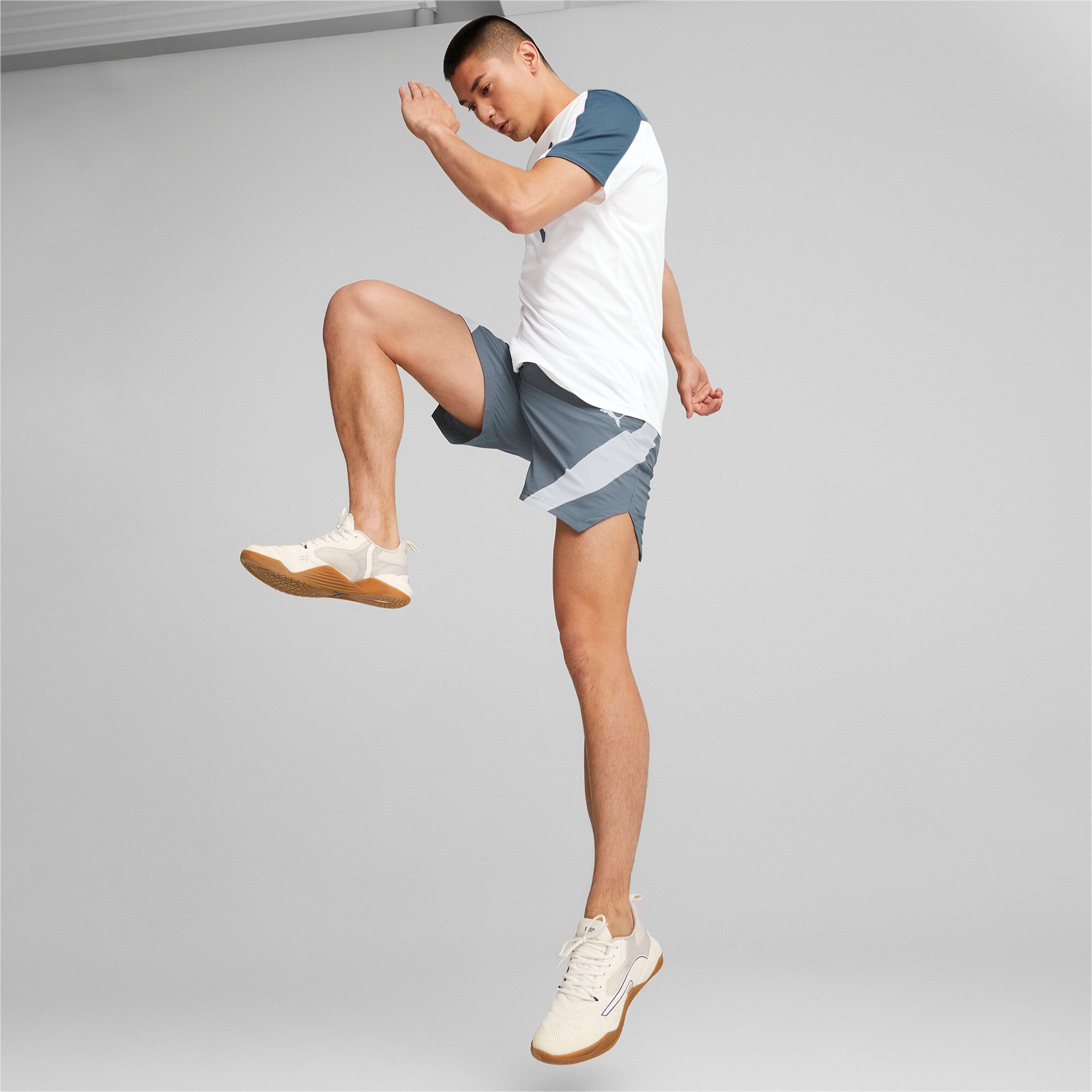Puma training fit woven 7" shorts in gray - Model Shot 03