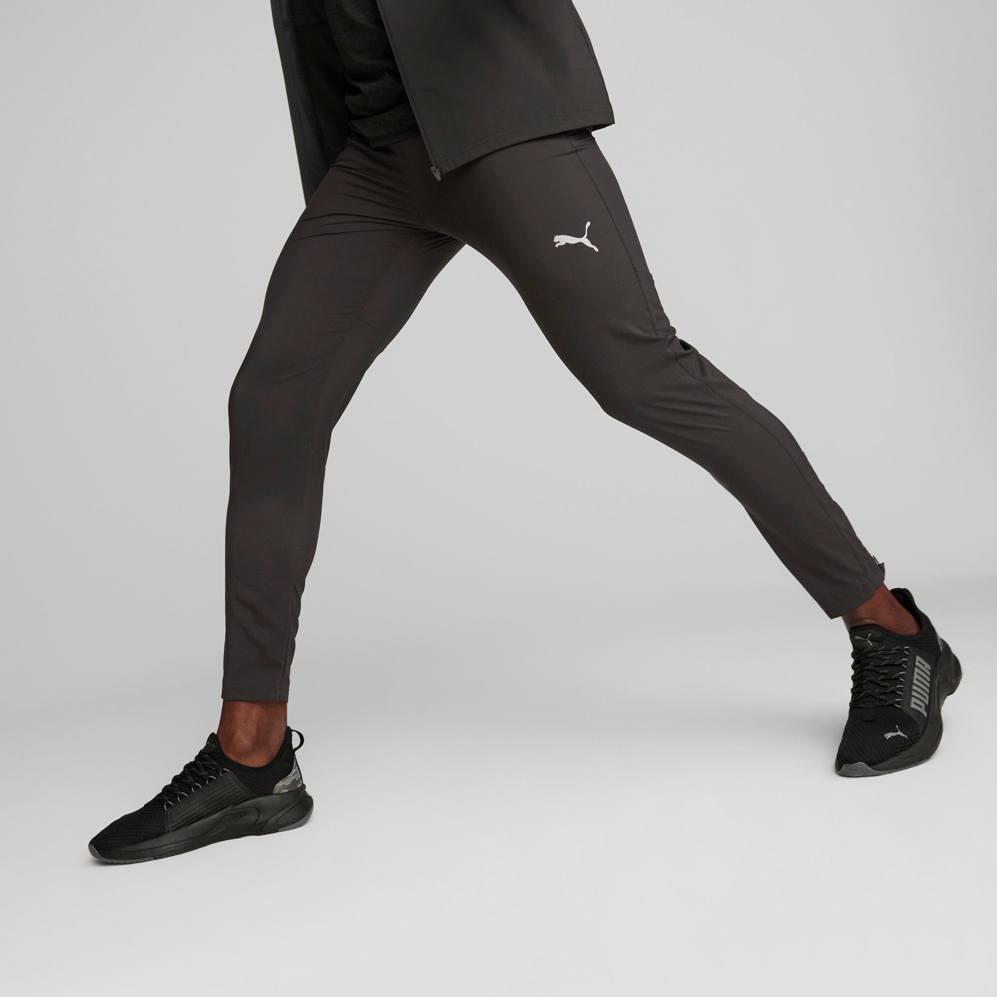 Puma running run favourite tapered pants in black - Model Shot 01