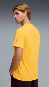 PUMA AC milan ftblculture tee men in yellow and red — model shot 2