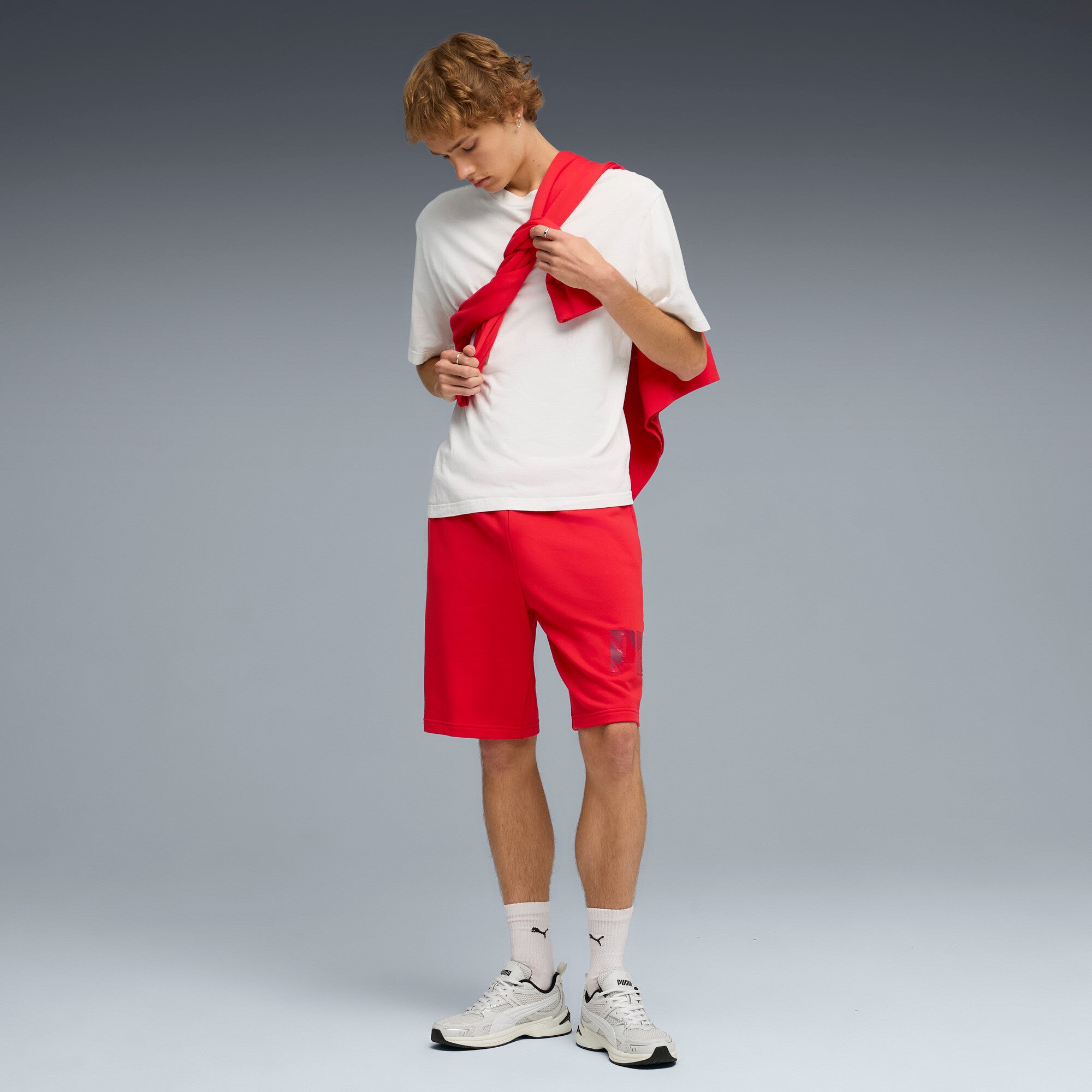 PUMA essentials logo lab 10’’ shorts men in for all time red — model shot 3