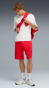 PUMA essentials logo lab 10’’ shorts men in for all time red — model shot 3
