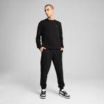 Puma essentials elevated pants in black - Model Shot 03