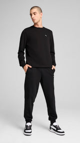 Puma essentials elevated pants in black - Model Shot 03