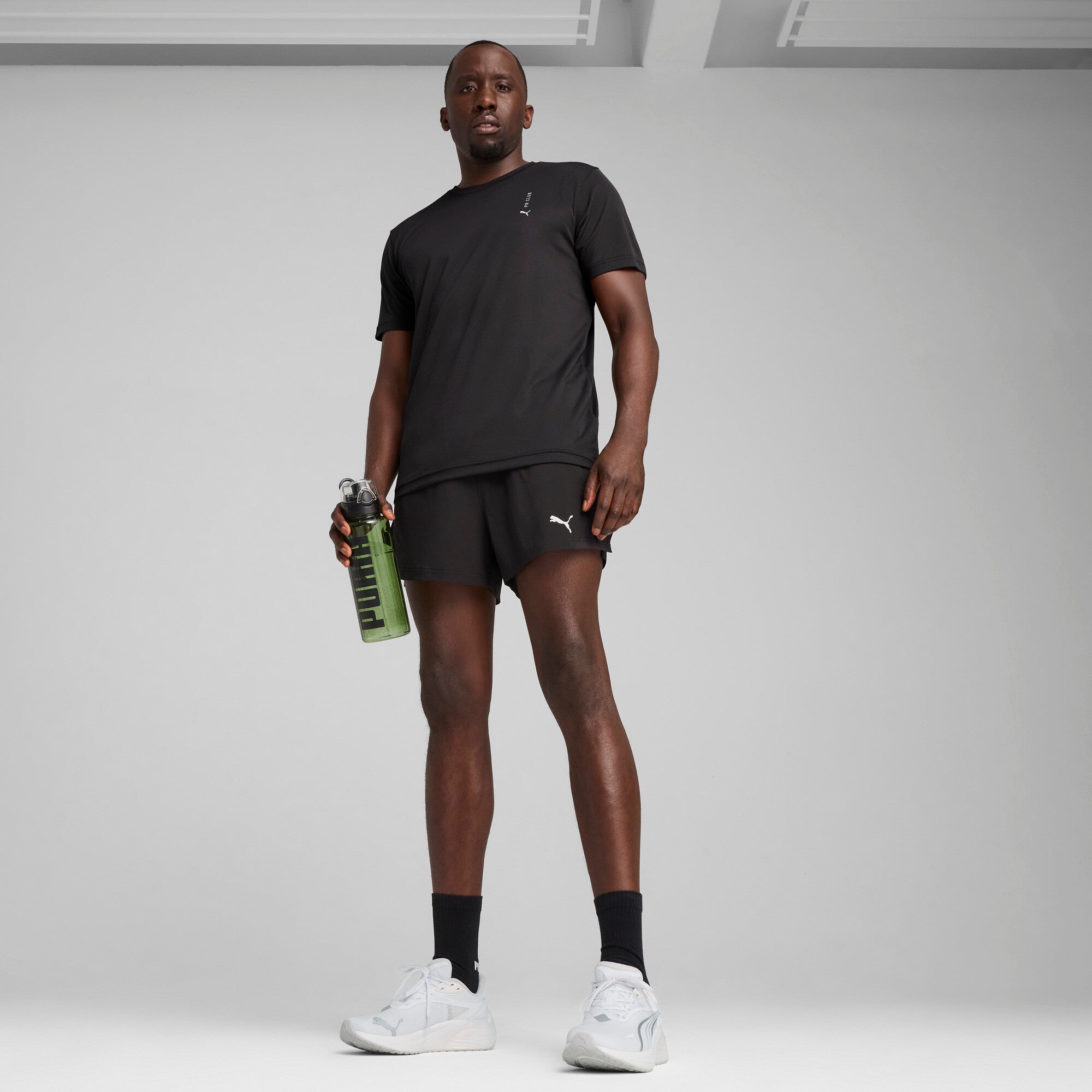 Puma graphic running tee in black - Model Shot 03