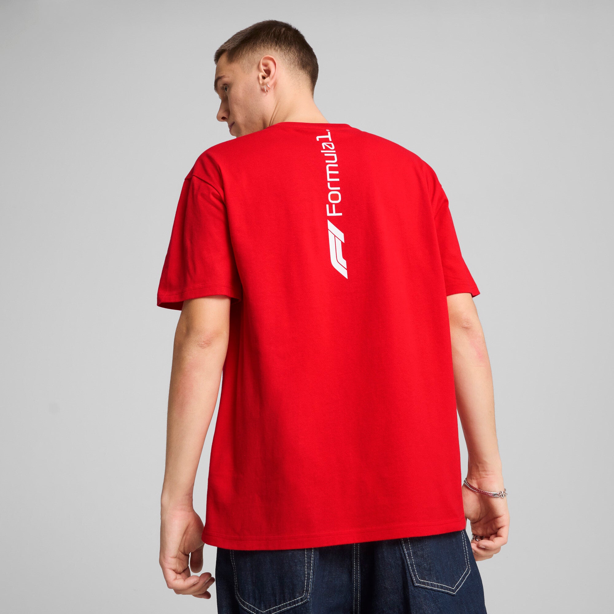 Puma F1® ESS+ relaxed graphic tee in black - Model Shot 02