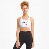 Puma mid impact 4keeps training bra in black - Model Shot 01
