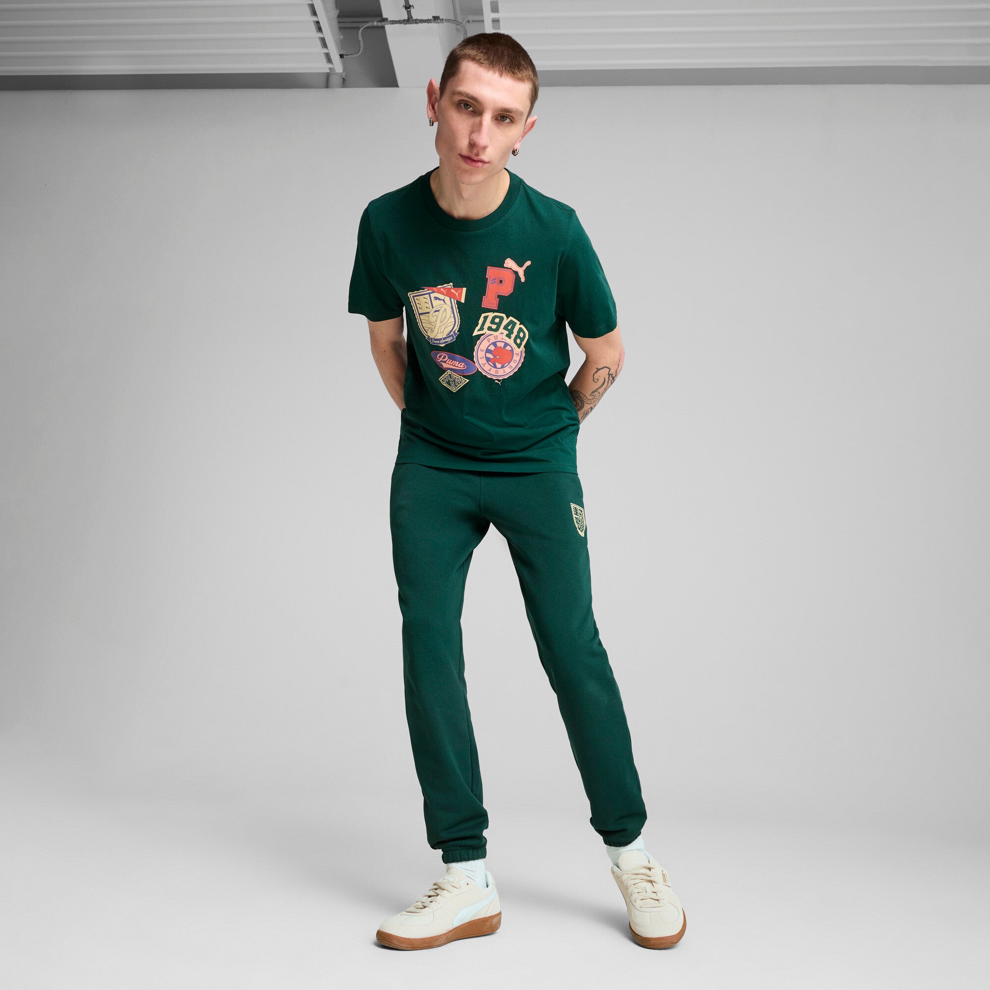 Puma sports legacy front graphic tee in dark myrtle - Model Shot 03
