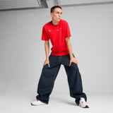Puma F1® ESS+ relaxed graphic tee in black - Model Shot 03