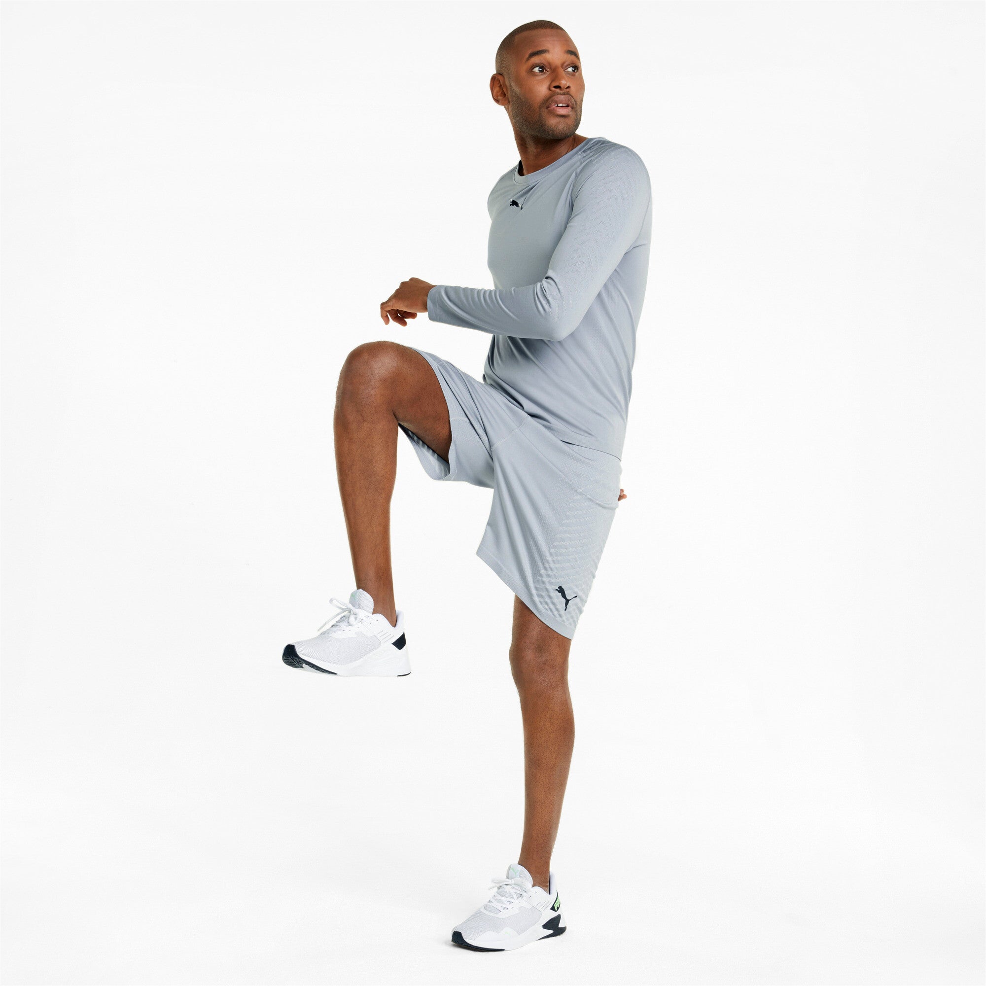 Puma training formknit seamless 7" shorts in black - Model Shot 03