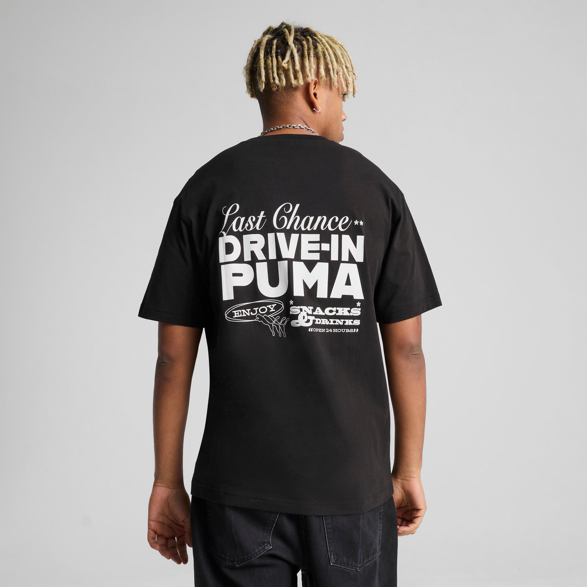 Puma graphics puma drive-in relaxed tee in black - Model Shot 02