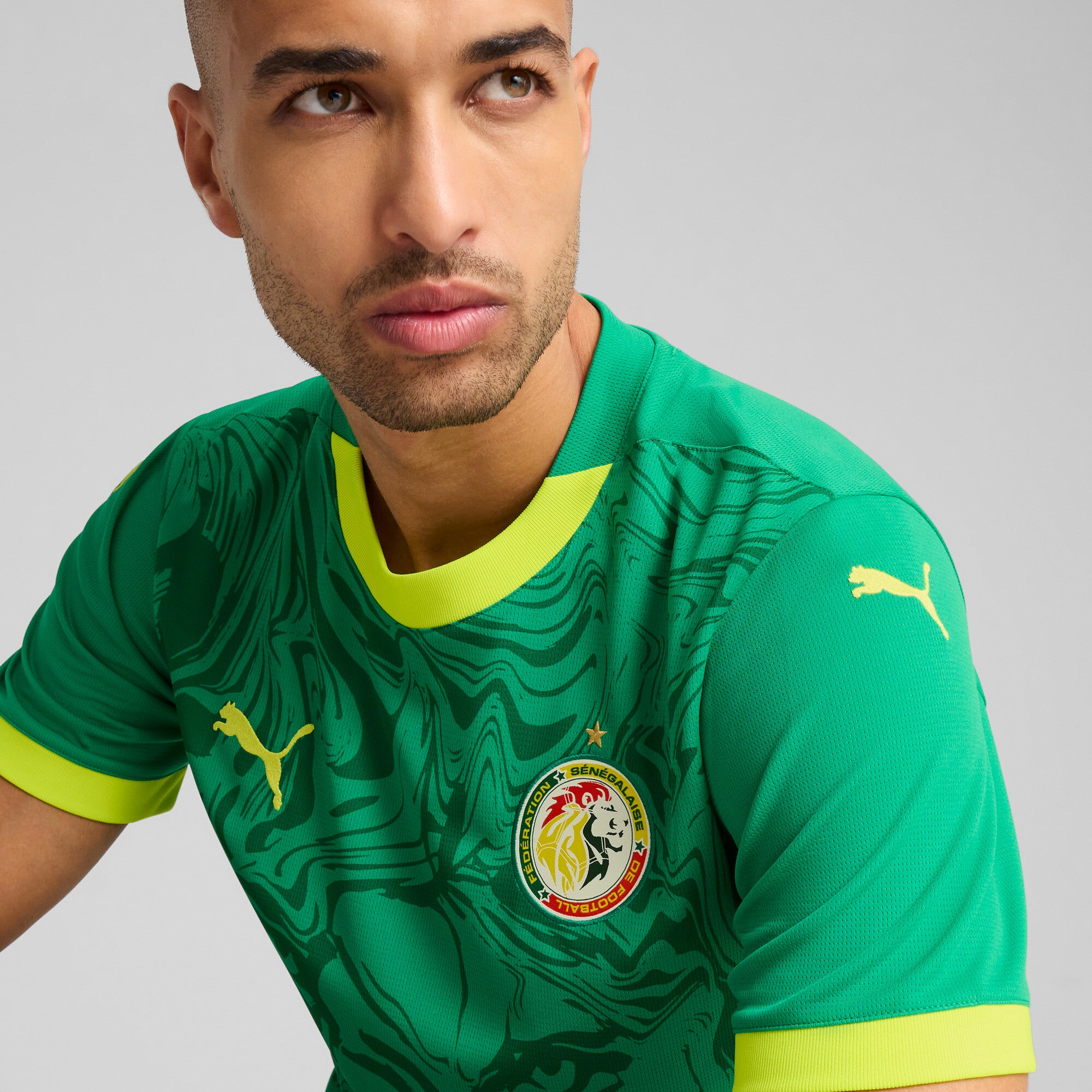 PUMA Senegal 2025 away jersey in sport green and electric lime - Model Shot 02