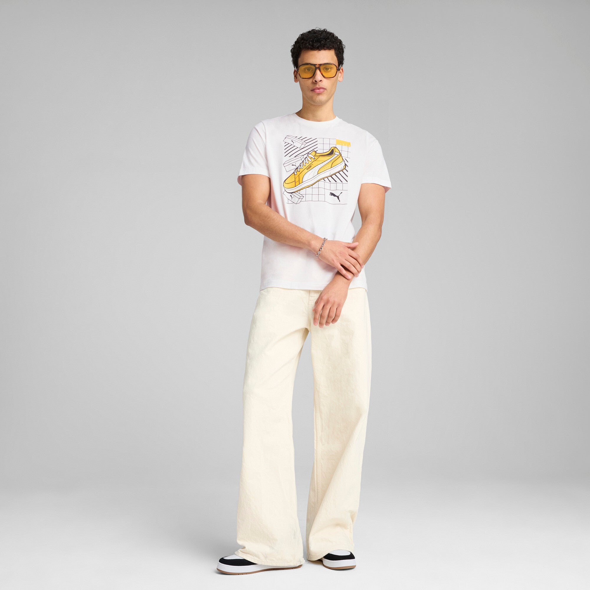 Puma graphics sneaker tee in white - Model Shot 03