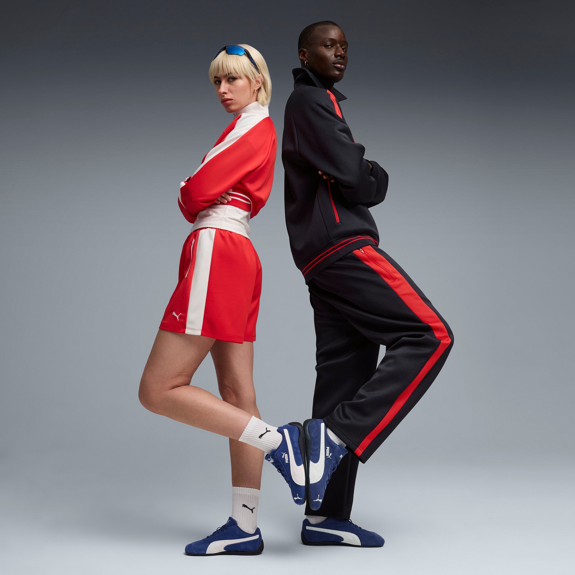 PUMA Speedcat OG sneakers in blue and black — model shot 2